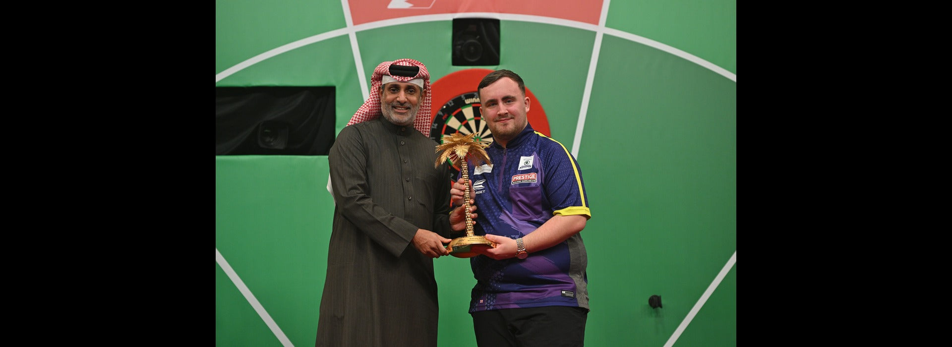 NINE-DART LITTLER CLAIMS BAHRAIN DARTS MASTERS GLORY
